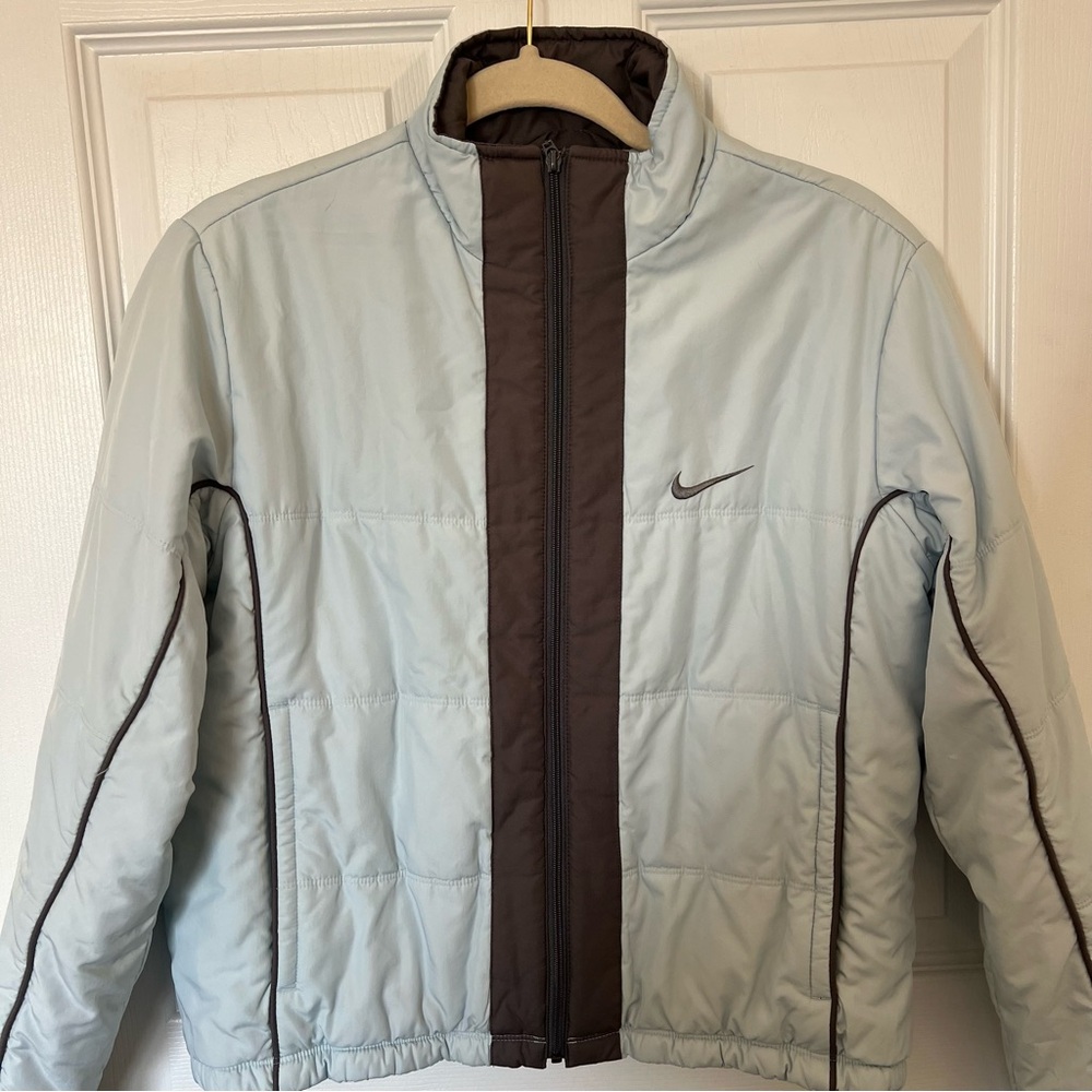 Vintage Women’s Nike Puffer in Baby Blue and Dark Brown